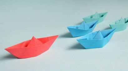 Paper Boats on Solid Surface