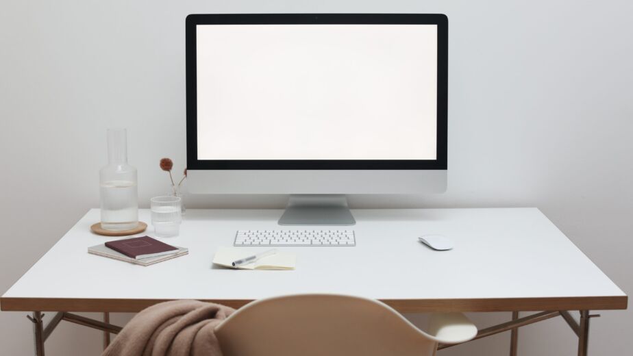 Free Stylish workspace with computer and simple furniture Stock Photo