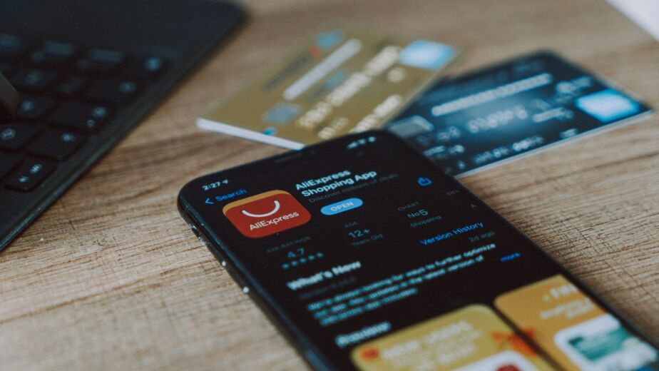 black and orange card on brown wooden table