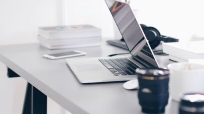 Free Gray Laptop on Table Top Stock Photo