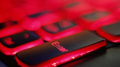 a close up of a red and black keyboard
