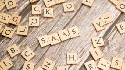 scrabble-letters-spelling-saas-on-a-wooden-tabl